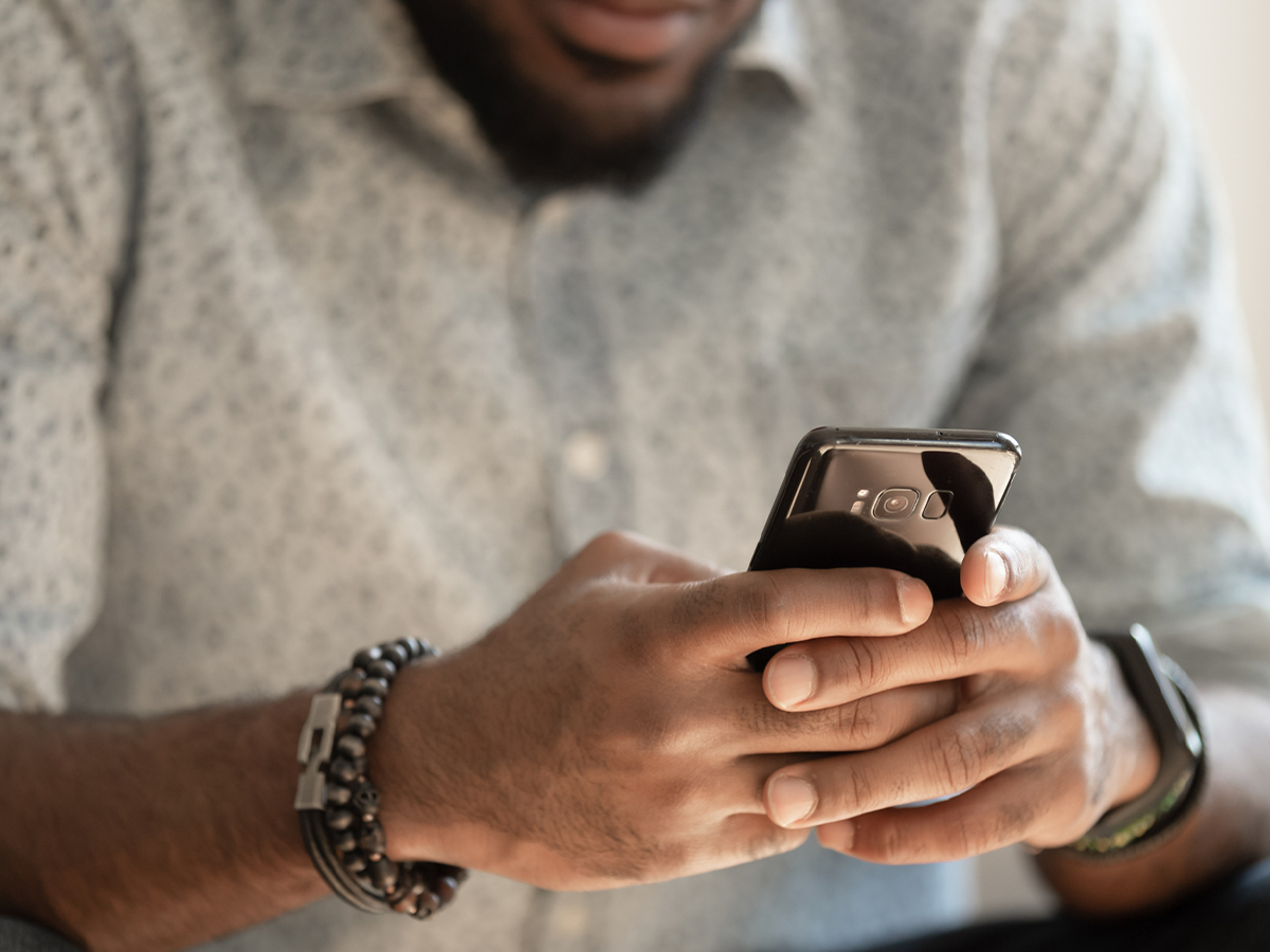 Image of someone on their phone